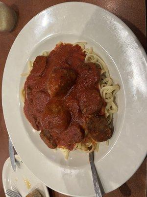 Linguine with marinara sauce, meatballs and sausage.