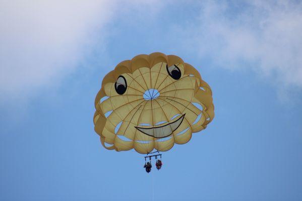 We are up, up and away.  Their parachute makes for a fantastic picture.