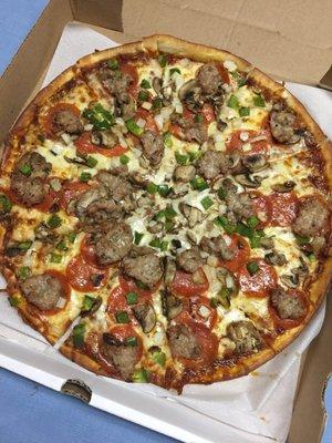 Large 14" King Supreme, thin crust, well-done.