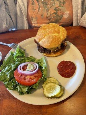 BBQ burger with pulled pork on the burger Patty.