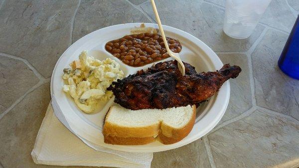 $9.75 gets you half barbecue chicken, pasta salad, baked beans, and buttered bread. You have to get your drinks inside.