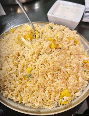 Chicken Fried Rice - Stir-fried rice cooked with vegetables and beaten egg and chicken.