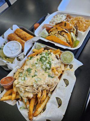 White Truffle Birria Fries (half chicken half beef) Beef Birria Eggrolls 3 Queso Beef Birria Tacos with Beans and Rice