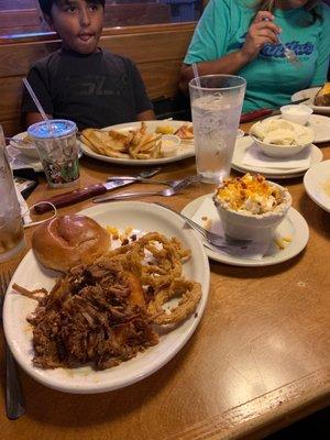 Pulled pork sandwich side mashed potatoes.