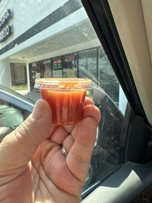 1 oz cup of salsa per $12 burrito...when ordering extra salsa.