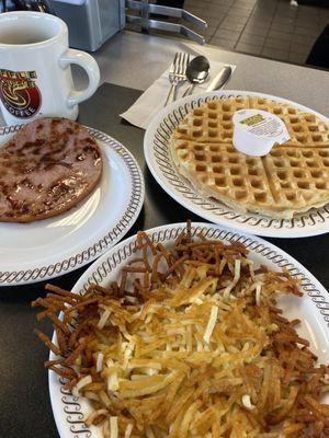 The spread! Waffle, ham & hash browns.