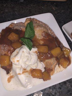 Sweet potato and pineapple empanadas w/ caramelized mangoes and vanilla ice cream