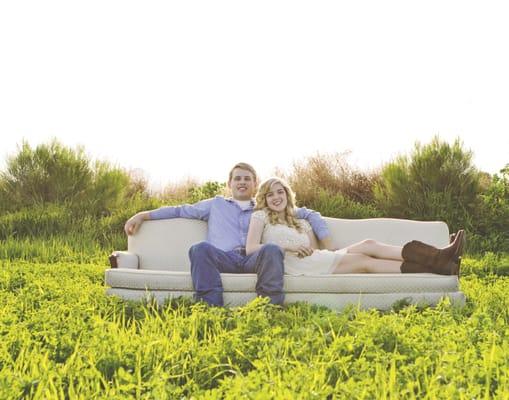 Engagement Photo on our Vintage White Couch in one of our fields!