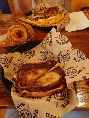 Reuben Sandwich and Onion rings.