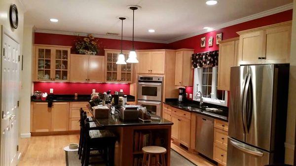 Deep red accent kitchen painting