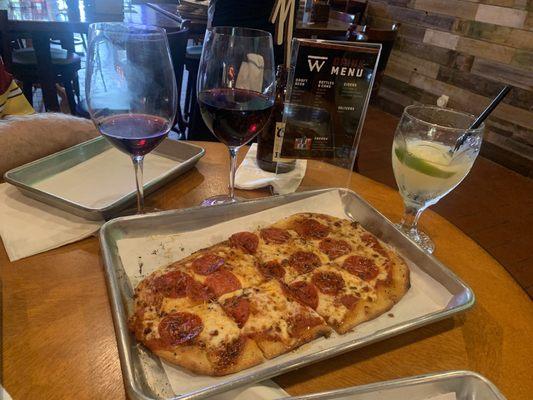 Pepperoni pizza, frozen margarita, wine