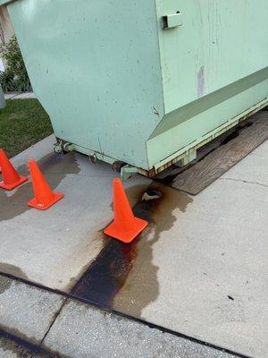 Rust left on driveway due to dumpsters used.