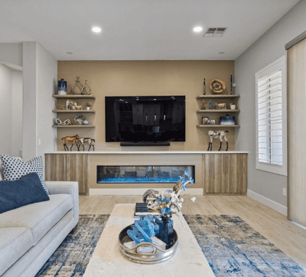 Did someone say shelves above a fireplace? This job was installing cabinets and shelves around a fireplace to showcase antiques!