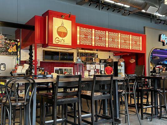 Gu's Dumplings counter.