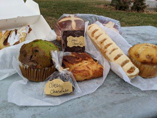 Fosters cinnamon twists, pistachio muffin, chocolate fudge, chocolate croissant, apple pie stick, cinnamon muffin, & pretzel buns