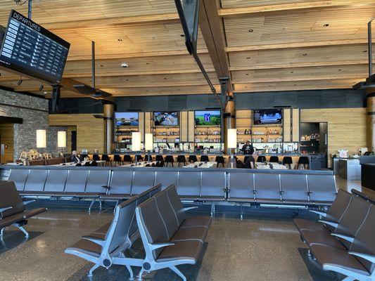 The bar and the many seating areas with charging stations