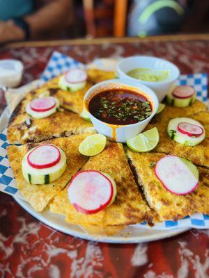 Pizza birria, and it's bigger than it looks- serves 2 people.