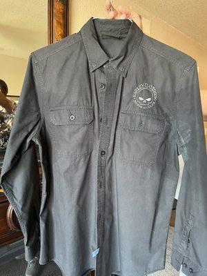 Harley Davison 100% cotton shirt covered in stains and wrinkled and now I'm missing a button.