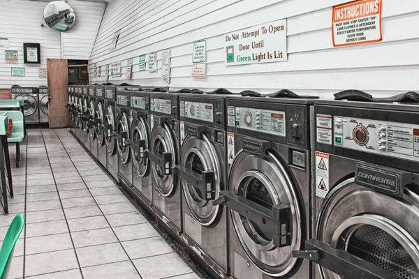 Washers at Habana Plaza Coin Laundry, current $2.50 for regular size loads