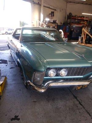 A clean 1964 Buick Riviera in for some work.