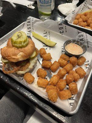 1/2 Lb Western Angus Burger We asked for Coastal sauce for the tots (charged $0.75 per cup - on ticket they called it Side Sriracha Ranch)