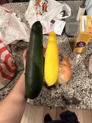 Zucchini, yellow squash, and an onion purchased at the market