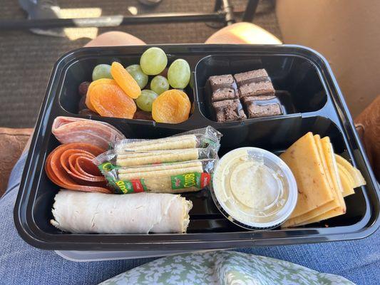 Charcuterie board provided on the ride with your ticket.