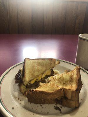 Hot sausage, egg, cheese on Texas Toast.