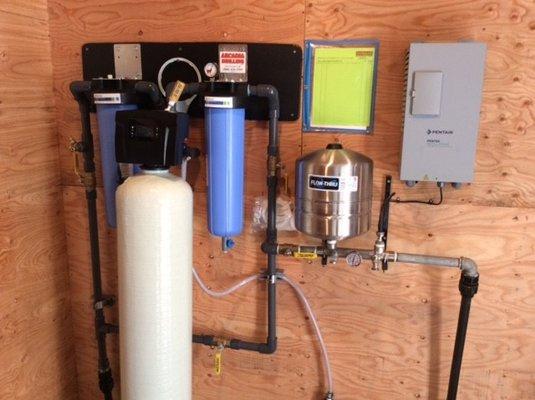 Wall Mounted Drive with pressure tank and full home water filtration system