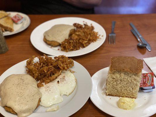 Chicken fried steak with crispy hash browns and home made biscuit