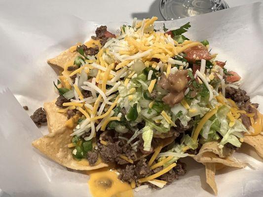 Loaded nachos.  Perfect match for a margarita.