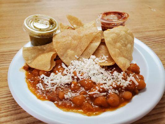 Complimentary chips, beans, and salsas