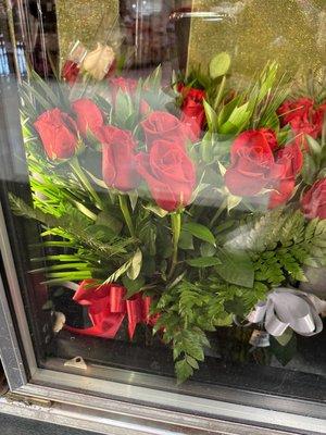 $59.99 dozen long stem roses