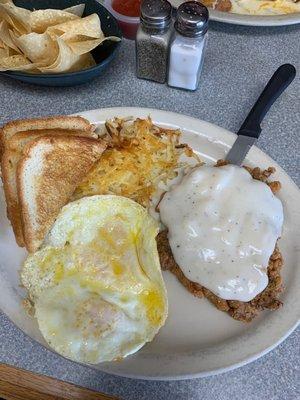 Chicken fried steak with eggs and hash browns for lunch. YUM!