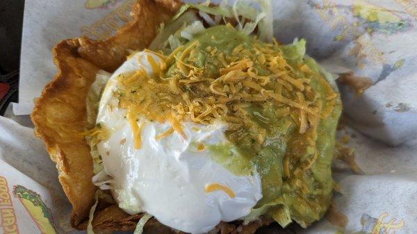 Taco salad with shredded chicken. Too much sour cream and guacamole, but I ate it all.