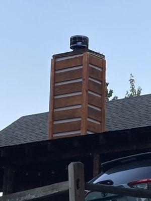 Took the old rock chimney that was leaking off and replaced with a lighter weight log cabin look chimney to match siding.