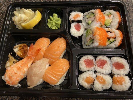 Sushi combo #6 with salmon, eel, shrimp, and yellowtail nigiri.