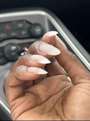 This is how the nail tech left my nails!