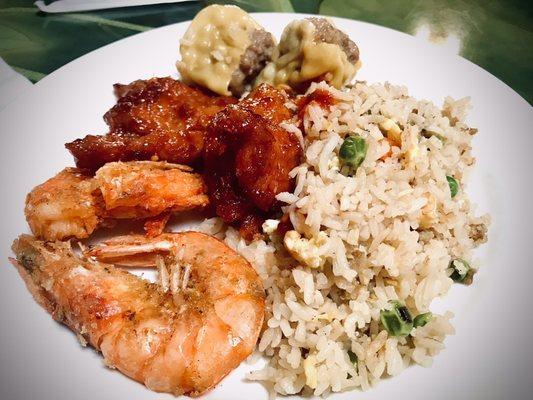 (Bottom left, going clockwise): Salt & pepper shrimp, BBQ pork, Suimai and fried rice with a little sambal