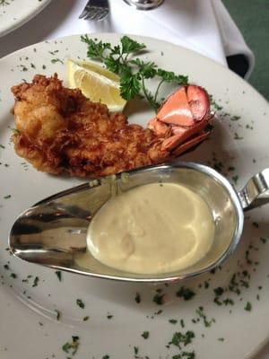 Fried lobster tail with a side of their lemon butter cream sauce