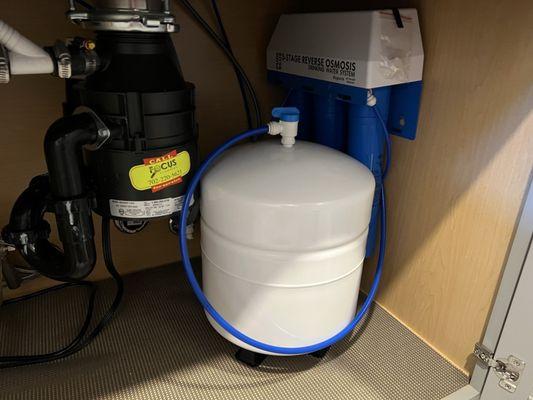 Reverse osmosis with filters under the sink.