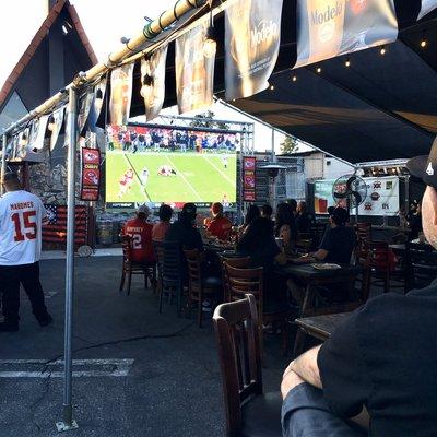 Perfect viewing spot from any area in our Outdoor Covered Patio. Table service is a available whenever the patio is open.