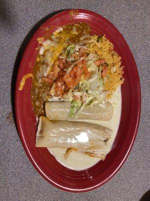 Tamale, enchilada, with rice and beans.