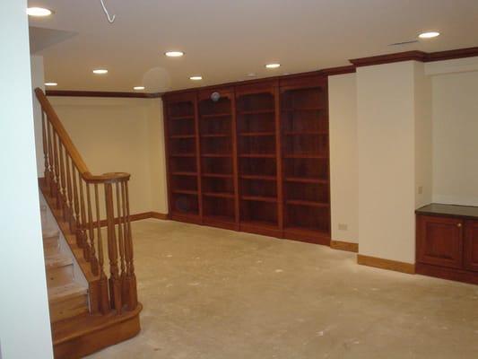 Finished full basement with bookcases..