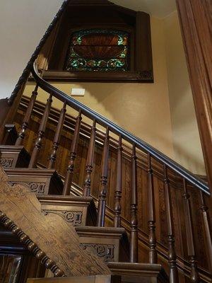 05.19.23 Love the wood details in the staircase and the stained glass windows!