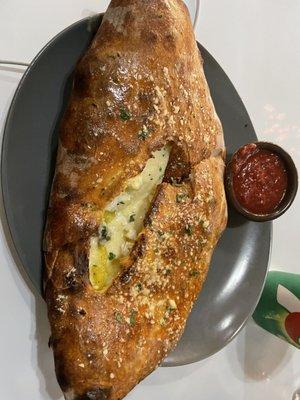 Baked 3 Cheese Calzone with mushrooms and banana peppers