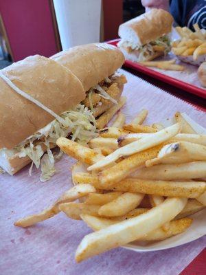 Shrimp po boy and fries, hot and fresh!