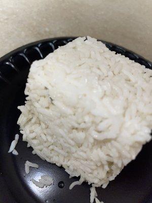 Don't act like you don't see the sliver of something or metal EMBEDDED in that rice