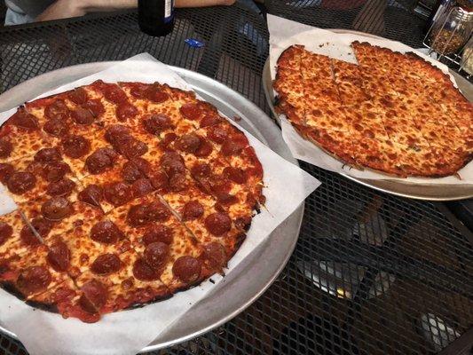 Pepperoni and cheese pizzas