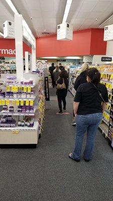 Huge line for Pharmacy,  you can't get away from the line here no matter what you are buying.